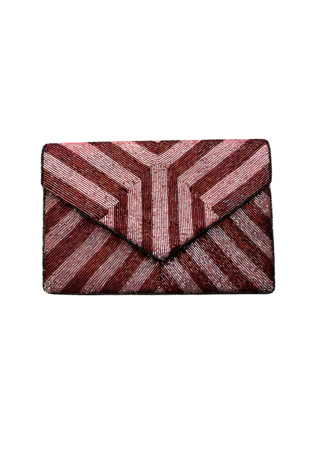 Sobre La Chic Cherry - Alquiler de vestido para Carteras en Bogotá - Click2Dress